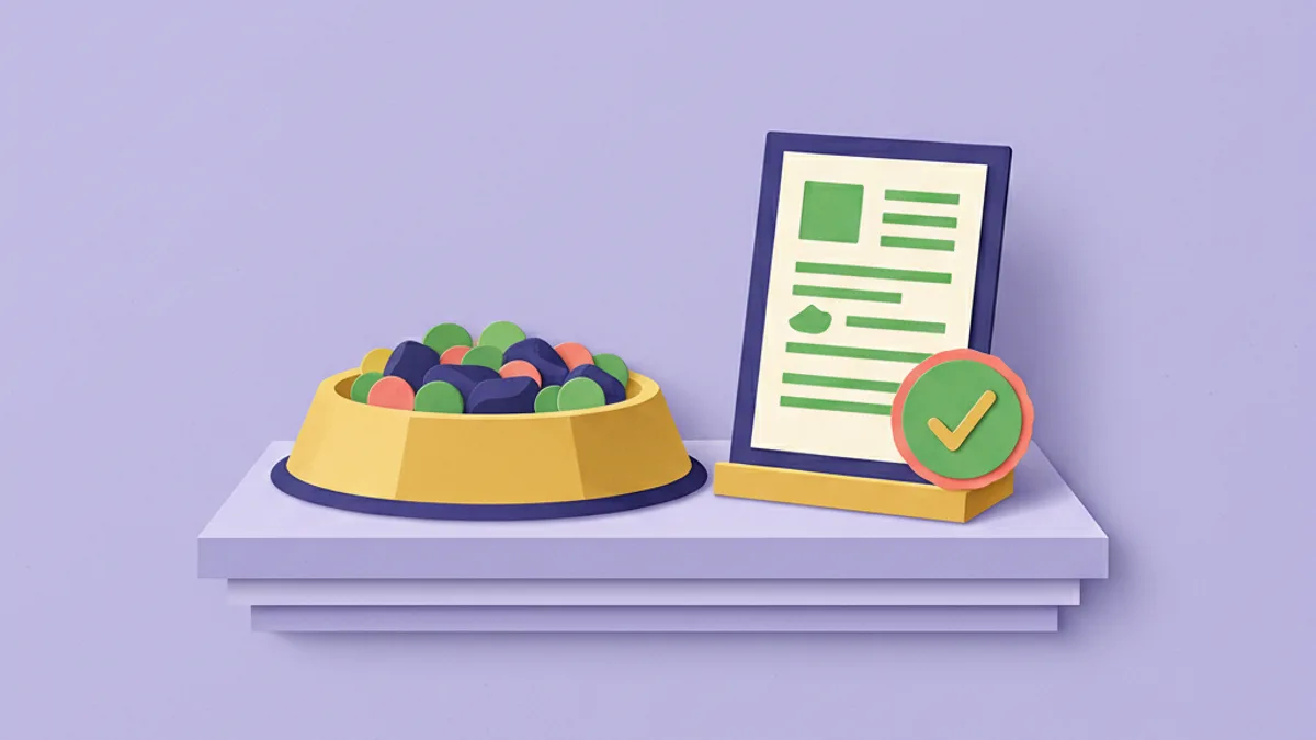 Paper-craft kitchen scene with a bowl of cooked meat and vegetables, a recipe card and a veterinary nutritionist's tick, for a home-cooked dog elimination diet